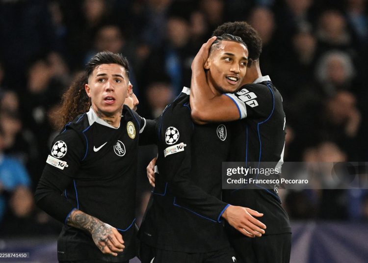 Joao Pedro of Chelsea celebrates with teammates after scoring his team's third goal during the UEFA Champions League 2025/26 League Phase MD8 match between SSC Napoli and Chelsea (Photo by Francesco Pecoraro/Getty Images)