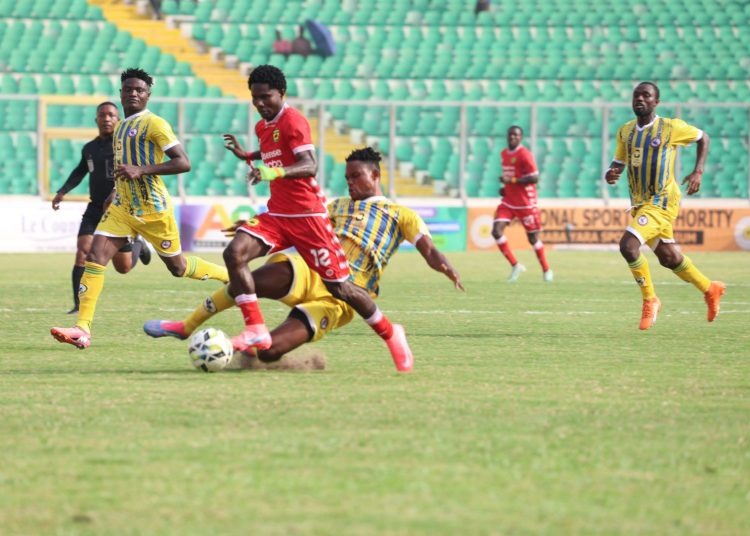 Shot from Kotoko (red)- Berekum Chelsea game Photo Courtesy: AKSC