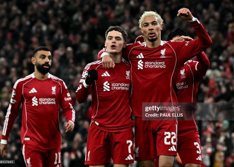 Liverpool's German midfielder #07 Florian Wirtz celebrates scoring the team's second goal with Liverpool's French striker #22 Hugo Ekitike (Photo by Paul ELLIS / AFP via Getty Images)