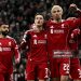 Liverpool's German midfielder #07 Florian Wirtz celebrates scoring the team's second goal with Liverpool's French striker #22 Hugo Ekitike (Photo by Paul ELLIS / AFP via Getty Images)