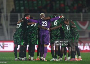 The Nigerian team huddles up during the AFCON Group C match between Mozambique and Nigeria (Photo by Ulrik Pedersen/NurPhoto via Getty Images)