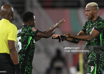 Nigeria's forward #09 Victor Osimhen is replaced by Nigeria's forward #15 Moses Simon during the Africa Cup of Nations (CAN) round of 16 football match between Nigeria and Mozambique (Photo by SEBASTIEN BOZON / AFP via Getty Images)