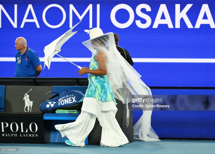 Naomi Osaka of Japan walks out ahead of the Women's Singles First Round match against Antonia Ruzic of Croatia on day three of the 2026 Australian Open at Melbourne Park on January 20, 2026 (Photo by Quinn Rooney/Getty Images)