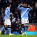Antoine Semenyo of Manchester City (R) celebrates scoring his team's sixth goal and his first ever goal for Manchester City, with teammate Rayan Cherki (L) during the Emirates FA Cup Third Round match between Manchester City and Exeter City (Photo by Lewis Storey/Getty Images)