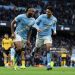 Antoine Semenyo of Manchester City celebrates scoring his team's second goal with teammate Omar Marmoush during the Premier League match between Manchester City and Wolverhampton Wanderers (Photo by Michael Regan/Getty Images)