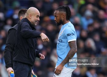 Pep Guardiola, Manager of Manchester City speaks to Antoine Semenyo of Manchester City on the side line during the Premier League match between Manchester City and Wolverhampton Wanderers. (Photo by Ed Sykes/Sportsphoto/Allstar via Getty Images)