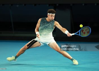 Ben Shelton of the United States plays a forehand against Casper Ruud of Norway during the Men's Singles Fourth Round match on day nine of the 2026 Australian Open (Photo by Lintao Zhang/Getty Images)