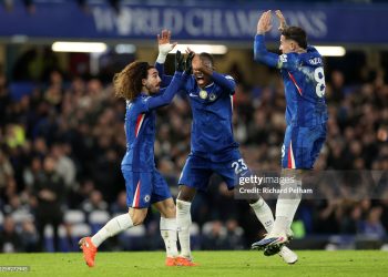 Marc Cucurella of Chelsea celebrates scoring his team's second goal with teammates Enzo Fernandez and Trevoh Chalobah during the Premier League match between Chelsea and West Ham United (Photo by Richard Pelham/Getty Images)