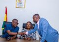 Sports Minister Kofi Adams with President for Arm-wrestling   Charles Asibey