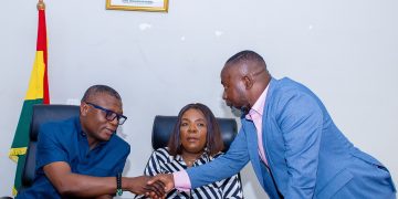 Sports Minister Kofi Adams with President for Arm-wrestling   Charles Asibey