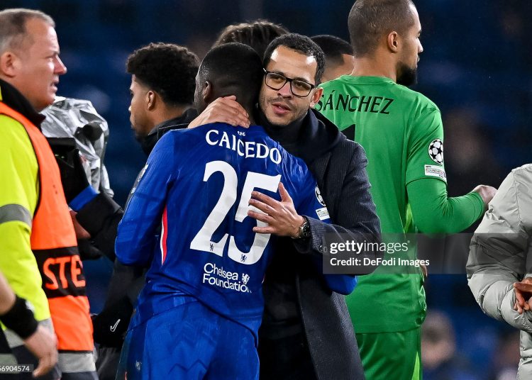 Moises Caicedo of FC Chelsea and head coach Liam Rosenior of FC Chelsea celebrate after winning the UEFA Champions League 2025/26 League Phase MD7 match between Chelsea FC and Pafos FC (Photo by Vince Mignott/DeFodi Images/DeFodi via Getty Images)