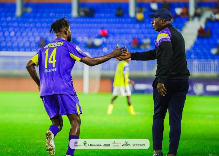 Ibrahim Tanko with Kamaradini Mamudu. Photo Courtesy: Ghanasoccernet