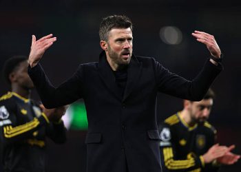 Michael Carrick, Head Coach of Manchester United, shows appreciation to the fans following the team's victory in the Premier League match between Arsenal and Manchester United at Emirates Stadium on January 25, 2026 in London, England. (Photo by Justin Setterfield/Getty Images)