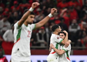 Morocco's forward #10 Brahim Diaz (R) celebrates scoring his team's first goal with Morocco's defender #02 Achraf Hakimi (2nd R) during the Africa Cup of Nations (CAN) quarter-final football match between Cameroon and Morocco at the Prince Moulay Abdallah stadium in Rabat on January 9, 2026. (Photo by Gabriel BOUYS / AFP via Getty Images)