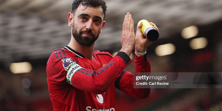 Bruno Fernandes of Manchester United applauds the fans as he celebrates victory during the Premier League match between Manchester United and Tottenham Hotspur (Photo by Carl Recine/Getty Images)