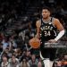 Giannis Antetokounmpo #34 of the Milwaukee Bucks dribbles the ball against the Denver Nuggets (Photo by Patrick McDermott/Getty Images)