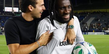 Joseph Paintsil #28 of Los Angeles Galaxy and Riqui Puig #10 celebrate a 4-1 win against Sporting Kansas City at Dignity Health Sports Park on September 27, 2025 in Carson, California. (Photo by Ronald Martinez/Getty Images)