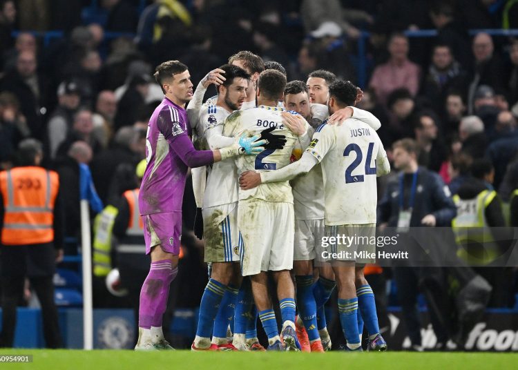 Players of Leeds United celebrate after they draw to Chelsea following the Premier League match between Chelsea and Leeds United (Photo by Mike Hewitt/Getty Images)