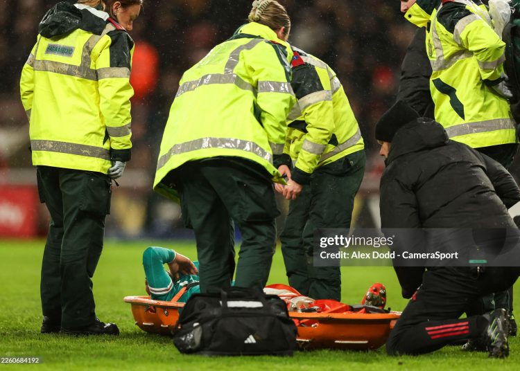 Liverpool's Wataru Endo is stretchered off the field in the second half of the Premier League match between Sunderland and Liverpool (Photo by Alex Dodd - CameraSport via Getty Images)