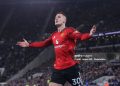 Benjamin Sesko of Manchester United celebrates after scoring their first goal during the Premier League match between Everton and Manchester United (Photo by James Gill - Danehouse/Getty Images)