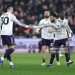Benjamin Sesko of Manchester United celebrates scoring his team's first goal with teammate Bruno Fernandes during the Premier League match between West Ham United and Manchester United (Photo by James Fearn/Getty Images)