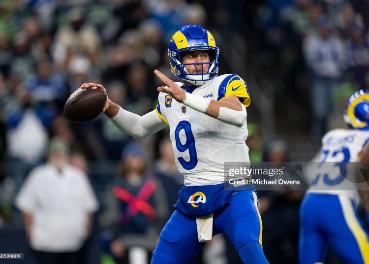 Matthew Stafford #9 of the Los Angeles Rams looks to pass during an NFC Championship NFL football game against the Seattle Seahawks (Photo by Michael Owens/Getty Images)