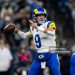 Matthew Stafford #9 of the Los Angeles Rams looks to pass during an NFC Championship NFL football game against the Seattle Seahawks (Photo by Michael Owens/Getty Images)