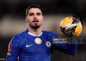 Pedro Neto of Chelsea celebrates victory on the pitch with the match ball after scoring a hat trick during the Emirates FA Cup Fourth Round match between Hull City and Chelsea (Photo by Carl Recine/Getty Images)