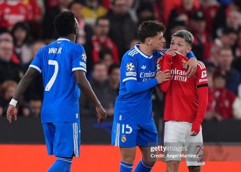 Gianluca Prestianni of Benfica speaks towards Vinicius Junior of Real Madrid during the UEFA Champions League 2025/26 League Knockout Play-off First Leg match between SL Benfica and Real Madrid C.F. (Photo by Angel Martinez/Getty Images)