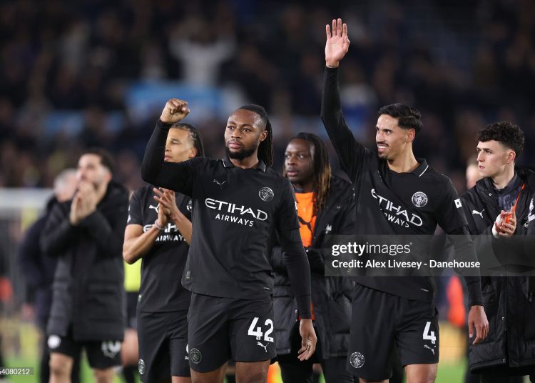 Antoine Semenyo and Tijjani Reijnders of Manchester City celebrate towards their support following the Premier League match between Leeds United and Manchester City (Photo by Alex Livesey - Danehouse/Getty Images)