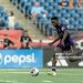 Shakur Mohammed #14 of Orlando City B brings the ball forward during a game between Orlando City B and New England Revolution II (Photo by Andrew Katsampes/ISI Photos/Getty Images).