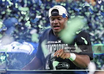 Kenneth Walker III #9 of the Seattle Seahawks celebrates after defeating the New England Patriots 29-13 to win Super Bowl LX (Photo by Kevin C. Cox/Getty Images)