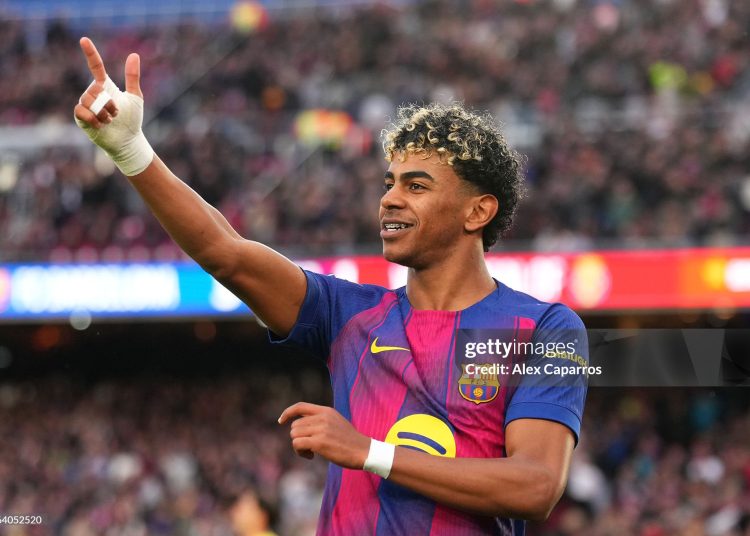 Lamine Yamal of FC Barcelona celebrates scoring his team's third goal and completing his hat-trick during the LaLiga EA Sports match between FC Barcelona and Villarreal CF (Photo by Alex Caparros/Getty Images)