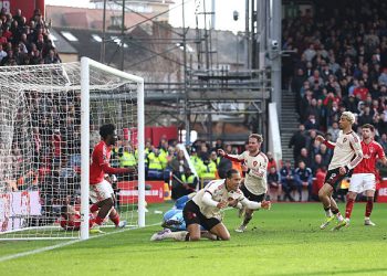 Alexis Mac Allister of Liverpool celebrates scoring his team's first goal during the Premier League match between Nottingham Forest and Liverpool at City Ground on February 22, 2026 in Nottingham, England. (Photo by Carl Recine/Getty Images)