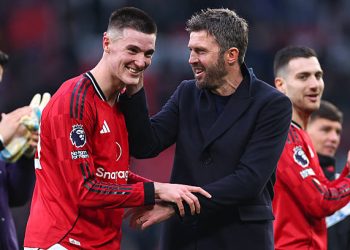 Manchester United head coach / manager Michael Carrick celebrates with Benjamin Sesko of Manchester United at full time during the Premier League match between Manchester United and Fulham at Old Trafford on February 1, 2026 in Manchester, United Kingdom. (Photo by Robbie Jay Barratt - AMA/Getty Images)