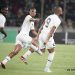 Razak Simpson celebrates scoring a goal with Black stars teammates