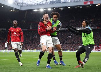 Benjamin Sesko of Manchester United celebrates scoring his team's third goal with teammates during the Premier League match between Manchester United and Fulham at Old Trafford on February 01, 2026 in Manchester, England. (Photo by Carl Recine/Getty Images)