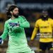 Liverpool's goalkeeper Alisson Becker throws the ball upfield during the Emirates FA Cup Fifth Round match between Wolverhampton Wanderers and Liverpool (Photo by Andrew Kearns - CameraSport via Getty Images)