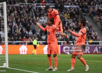 Lamine Yamal of FC Barcelona celebrates scoring his team's first goal with teammates during the UEFA Champions League 2025/26 Round of 16 First Leg match between Newcastle United FC and FC Barcelona (Photo by George Wood/Getty Images)