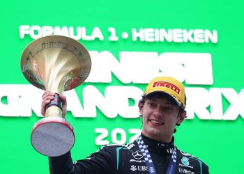Race winner Andrea Kimi Antonelli of Italy and Mercedes AMG Petronas F1 Team on the podium with his trophy during the F1 Grand Prix of China at Shanghai International Circuit on March 15, 2026 in Shanghai, China. (Photo by Mark Thompson/Getty Images)