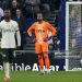 Chelsea's Spanish goalkeeper #01 Robert Sanchez reacts after conceding the teams first goal during the English Premier League football match between Everton and Chelsea (Photo by Darren Staples / AFP via Getty Images)