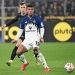 Dortmund's German defender #04 Nico Schlotterbeck (L) and Hamburg's Ghanaian forward #11 Ransford Konigsdorffer vie for the ball during the German first division Bundesliga football match between Borussia Dortmund and HSV Hamburg in Dortmund, western Germany, on March 21, 2026. (Photo by UWE KRAFT / AFP via Getty Images) / DFL REGULATIONS PROHIBIT ANY USE OF PHOTOGRAPHS AS IMAGE SEQUENCES AND/OR QUASI-VIDEO