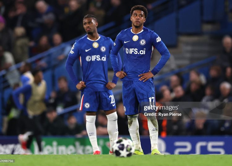 Andrey Santos of Chelsea looks dejected after Senny Mayulu of Paris Saint-Germain (not pictured) scored his team's third goal during the UEFA Champions League 2025/26 Round of 16 Second Leg match between Chelsea FC and Paris Saint-Germain FC (Photo by Ryan Pierse/Getty Images)