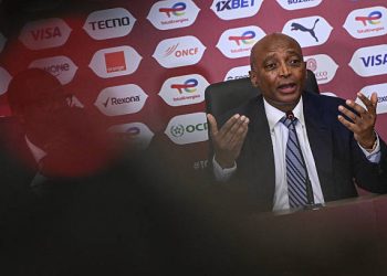 Confederation of African Football President Patrice Motsepe speaks during a press conference at Prince Moulay Abdellah Stadium in Rabat, Morocco on December 20, 2025, ahead of the start of the Africa Cup of Nations (CAN) football tournament. Morooco take on Comoros in the opening game on December 21. (Photo by SEBASTIEN BOZON / AFP via Getty Images)