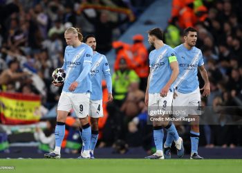 Erling Haaland, Tijjani Reijnders, Ruben Dias and Rodri of Manchester City look dejected during the UEFA Champions League 2025/26 Round of 16 Second Leg match between Manchester City FC and Real Madrid CF (Photo by Michael Regan/Getty Images)