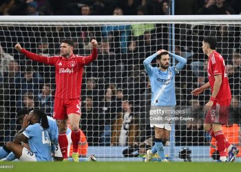 Morato of Nottingham Forest celebrates his teams draw as Bernardo Silva of Manchester City looks dejected following the Premier League match between Manchester City and Nottingham Forest (Photo by Gareth Copley/Getty Images)