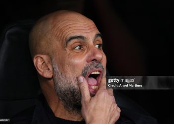 Pep Guardiola, Manager of Manchester City, looks on prior to the UEFA Champions League 2025/26 Round of 16 First Leg match between Real Madrid CF and Manchester City FC (Photo by Angel Martinez/Getty Images)