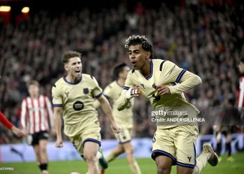 Barcelona's Spanish forward #10 Lamine Yamal celebrates scoring his team's first goal during the Spanish league football match between Athletic Club Bilbao and FC Barcelona (Photo by ANDER GILLENEA / AFP via Getty Images)