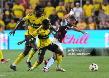 Emiliano Buendia #10 of Aston Villa controls the ball between Derrick Jones #5 and Yaw Yeboah #14 of the Columbus Crew during the second half at Lower.com Field on July 27, 2024 in Columbus, Ohio. (Photo by Jason Mowry/Getty Images)