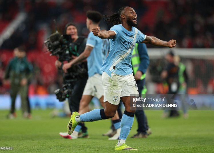 Manchester City's Ghanaian midfielder #42 Antoine Semenyo  celebrates after the English League Cup final football match between Arsenal and Manchester City at Wembley Stadium in London on March 22, 2026. City won the game 2-0. (Photo by Adrian Dennis / AFP via Getty Images)